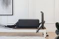 Load image into Gallery viewer, CoreCollab Queen Studio Pilates Reformer Half View
