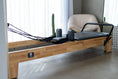 Load image into Gallery viewer, CoreCollab Studio ECO Pilates Reformer Half View 2