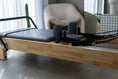Load image into Gallery viewer, CoreCollab Studio ECO Pilates Reformer Half View
