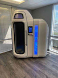 Load image into Gallery viewer, White 3D printer with digital display in an office setting
