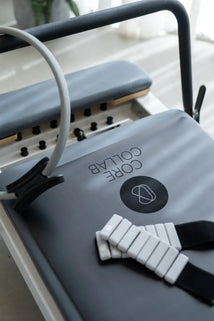 Gym equipment with 'Collab Core' branding on a blurred background